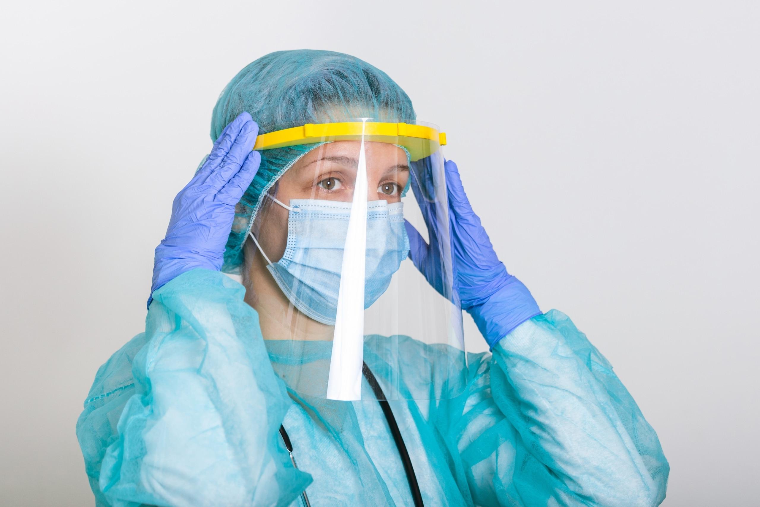 Healthcare professional in PPE suit